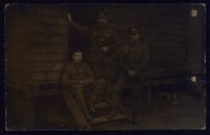 Three Soldiers Pose on Steps   (click for a larger preview)