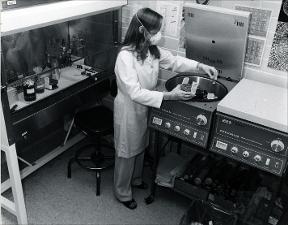 Woman in Lab Wearing a Mask   (click for a larger preview)