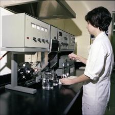 Woman Works with Beakers of Fluids, number 4   (click for a larger preview)