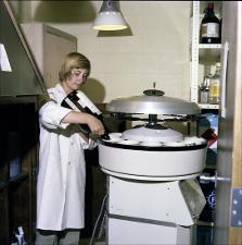 Lab Technician Fills Equipment with a Liquid   (click for a larger preview)