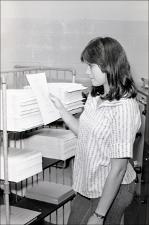 Woman with Photocopied Stacks of Papers, number 1   (click for a larger preview)