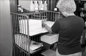 Woman Stacking Papers   (click for a larger preview)