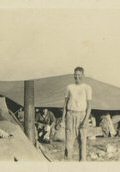 Man Standing near Tent   (click for a larger preview)