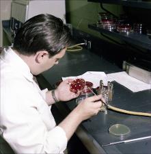 Man Checks Samples in a Petri Dish, number 1   (click for a larger preview)
