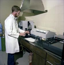 Man in a Lab Holds a Beaker and a Test Tube   (click for a larger preview)