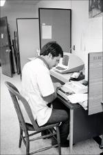 Man Uses a Typewriter in the Biomedical Learning Resource Center, number 1   (click for a larger preview)