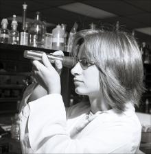 Laboratory Staff Looks Through Refractometer, number 1   (click for a larger preview)