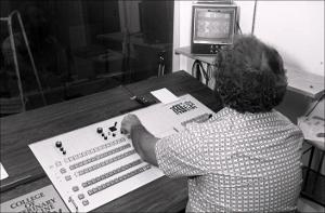 Man Monitors Equipment in Recording Studio, number 2   (click for a larger preview)